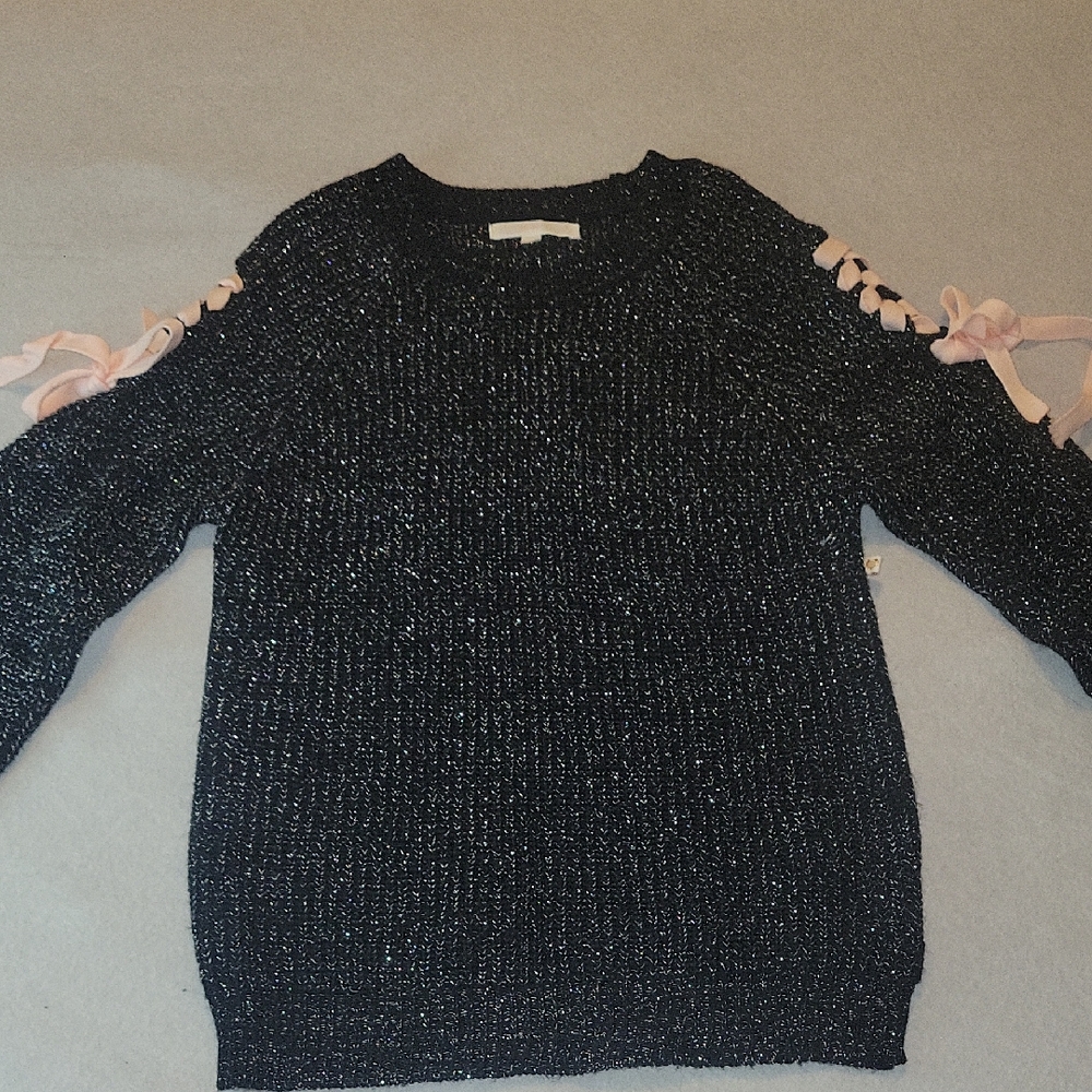 Stylish Black Knit Sweater with Pink Lace-Up Sleeves